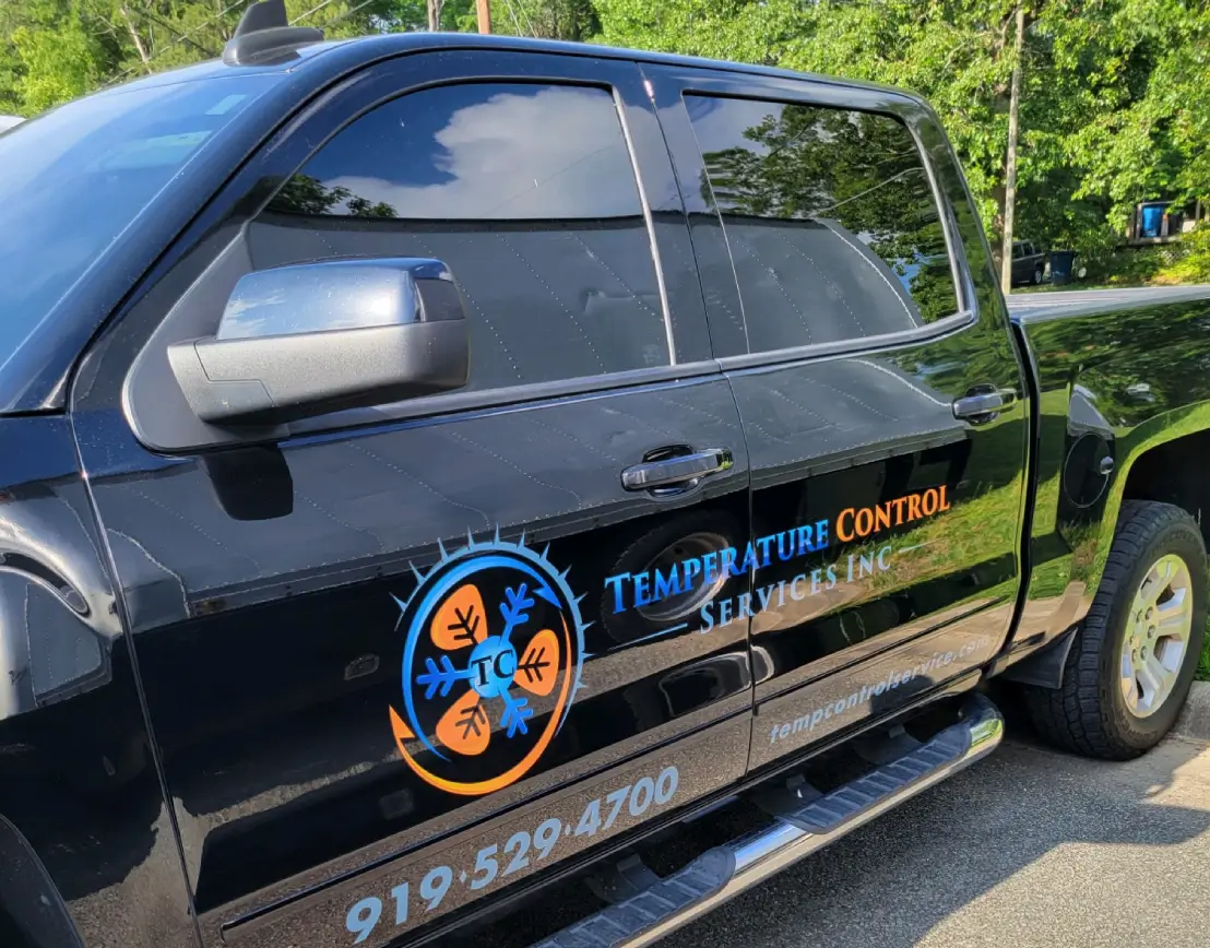 A Temperature Control Services service truck with the company logo, phone number, and website